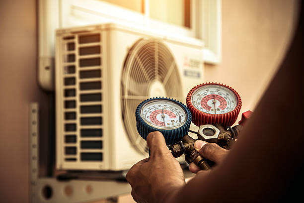 Professional Air Conditioning Service technician working in Maywood, CA